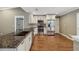 Spacious kitchen features stainless steel appliances, granite countertops, and ample cabinet space at 2827 Oak Tree Ln, Palm Harbor, FL 34684
