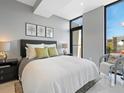 Spacious bedroom with a comfortable bed and stylish decor at 1558 4Th St # 406, Sarasota, FL 34236