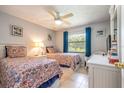 Guest bedroom with two twin beds and ample closet space at 4450 47Th W Ave # 202, Bradenton, FL 34210