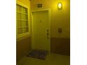 Inviting entryway with a colorful doormat at 1010 Villagio Cir # 106, Sarasota, FL 34237