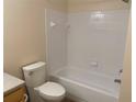 Clean bathroom with a bathtub and shower at 1010 Villagio Cir # 106, Sarasota, FL 34237