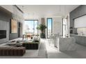 Open concept living room with marble kitchen island and city views at 430 Kumquat Ct # 510, Sarasota, FL 34236