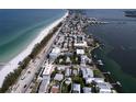 Aerial view of property and surrounding neighborhood at 106 11Th S St # A, Bradenton Beach, FL 34217