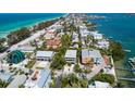 Aerial view showcasing home's location near the water at 106 11Th S St # A, Bradenton Beach, FL 34217