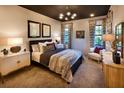 Spacious bedroom with a sitting area and decorative accents at 640 N Owl Dr, Sarasota, FL 34236