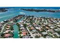 Luxury waterfront community with a vacant lot highlighted at 640 N Owl Dr, Sarasota, FL 34236