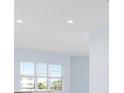 Bright living room with large windows offering an outdoor view at 3426 79Th Street W Cir # 202, Bradenton, FL 34209