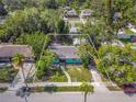 Aerial view of a single-Gathering home with a yard at 512 1St E Ave, Bradenton, FL 34208