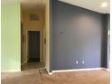 Bright hallway with light walls and neutral flooring at 1562 Jakway Rd, North Port, FL 34288