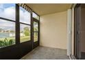 Cozy screened porch overlooking the lake at 25275 Rampart Blvd # 303, Punta Gorda, FL 33983