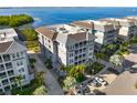 Stunning aerial view of waterfront property and parking at 392 Aruba Cir # 202, Bradenton, FL 34209