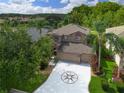 Two-story house with three-car garage and landscaped yard at 8108 Haven Harbour Way, Bradenton, FL 34212
