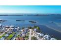 Aerial view of waterfront community with houses and canals at 1910 Oregon Trl, Englewood, FL 34224