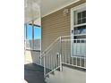 Side steps leading to the manufactured home's entrance at 1825 Innisbrook Ln, Sarasota, FL 34234