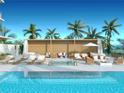 Inviting pool area with lounge chairs, shaded seating, palm trees, and a pergola for ultimate relaxation at 223 Golden Gate Point # 8B, Sarasota, FL 34236