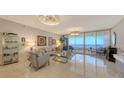 Spacious living room with water views and modern furnishings at 3040 Grand Bay Blvd # 283, Longboat Key, FL 34228
