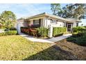 Spacious villa with private entrance and manicured landscaping at 909 Barclay Ct, Venice, FL 34293