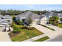 Single-Gathering home with a two-car garage and manicured lawn at 4618 Deep Creek Ter, Parrish, FL 34219