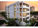 Modern building exterior with pool at 509 Golden Gate Pt # 2, Sarasota, FL 34236
