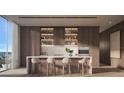 Modern kitchen with island, sleek cabinetry, and city views at 668 Quay Commons # 506, Sarasota, FL 34236