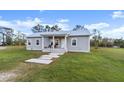 Charming one-story home with a covered porch at 34452 Singletary Rd, Myakka City, FL 34251