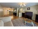 Living room with hardwood floors, and open floor plan at 8807 White Sage Loop # 1903, Lakewood Ranch, FL 34202