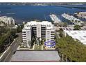 Aerial view of waterfront building with balcony at 1400 Barcarrota Blvd W # 201, Bradenton, FL 34205