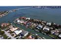 Aerial view of waterfront property with private dock at 414 Meadow Lark Dr, Sarasota, FL 34236