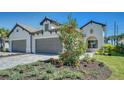 Two-car garage home with Mediterranean style at 27460 Janzen Ct, Englewood, FL 34223
