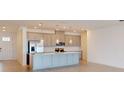 Open concept kitchen with large island and stainless steel appliances at 1575 Laurel Brook Ln, Port Charlotte, FL 33953