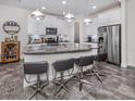 Modern kitchen with stainless steel appliances and granite countertops at 8624 Rain Song Rd, Sarasota, FL 34238
