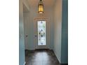 Bright entryway with decorative stained glass door at 5009 Sturbridge Ct, Sarasota, FL 34238