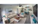 Open and airy living room with modern decor at 5524 37Th E St # 0, Bradenton, FL 34203