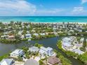 Coastal community with waterfront homes and beach access at 111 Gull Dr, Anna Maria, FL 34216