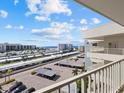 Stunning view of ocean, beach, and surrounding buildings at 5780 Midnight Pass Rd # 710, Sarasota, FL 34242