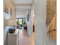 Bright and spacious condo entryway with view to living room at 16804 Vardon Ter # 104, Bradenton, FL 34211