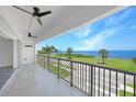 Spacious balcony with water view and fans at 1425 Park Beach Cir # 122, Punta Gorda, FL 33950