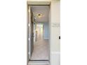 Bright entryway with tile floors and chandelier at 5654 Simonton St, Bradenton, FL 34203