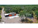 Aerial view of property with two homes and a workshop at 6010 Wauchula Rd, Myakka City, FL 34251