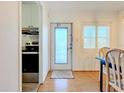 Bright entryway with view of kitchen and dining area at 1521 Pleasant Rd # A24, Bradenton, FL 34207