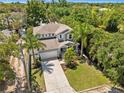 Two-story house with gray siding, aerial view at 1800 Robinhood St, Sarasota, FL 34231