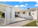 Covered carport and walkway to condo entrance at 6038 Lilli Way # 6038, Bradenton, FL 34207