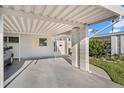 Condo entrance with covered carport parking at 6038 Lilli Way, Bradenton, FL 34207