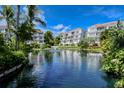 Waterfront community with lush tropical landscaping at 360 Gulf Of Mexico Dr # 322, Longboat Key, FL 34228