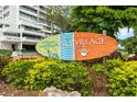 Siesta Key Village sign in front of lush greenery at 4660 Ocean Blvd # Q2, Sarasota, FL 34242