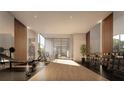 State-of-the-art fitness center with wood flooring and equipment at 1305 4Th St # 502D, Sarasota, FL 34236