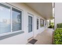Condo hallway with access to unit, featuring a clean and well-maintained appearance at 4440 Ironwood Cir # 108D, Bradenton, FL 34209