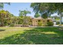 House exterior showcasing landscaping and front entrance at 14719 1St E Ave, Bradenton, FL 34212