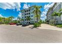 Come Monday building exterior with parking at 379 Aruba Cir # 202, Bradenton, FL 34209