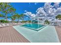Refreshing community pool with a large deck at 6800 Placida Rd # 281, Englewood, FL 34224
